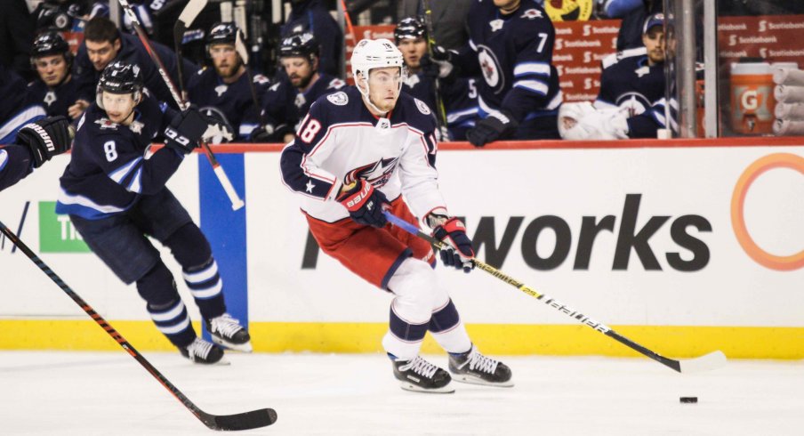 Jan 31, 2019; Winnipeg, Manitoba, CAN; Columbus Blue Jackets forward Pierre Luc Dubois (18) skates into the Winnipeg Jets zone during the first period at Bell MTS Place. 