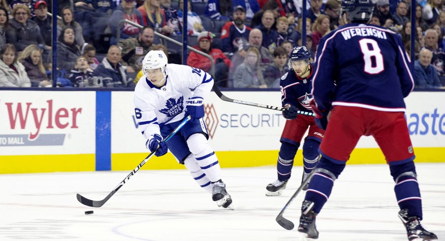 Toronto Maple Leafs right wing Mitchell Marner (16) skates with the puck up ice during the second period against the Columbus Blue Jackets at Nationwide Arena.