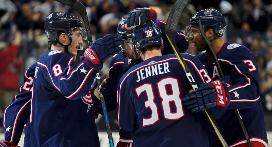 The Blue Jackets celebrate a goal scored by Boone Jenner during a game at Nationwide Arena.