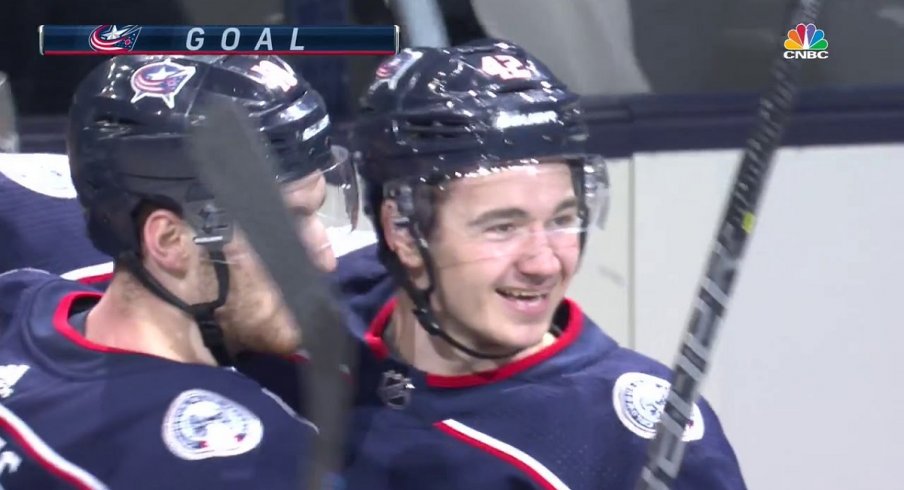 Alexandre Texier celebrates a goal with Pierre-Luc Dubois