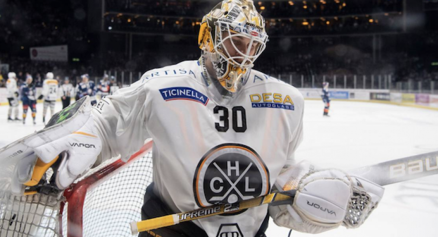 Blue Jackets goaltender Elvis Merzlikins looks on during a game with HC Lugano.