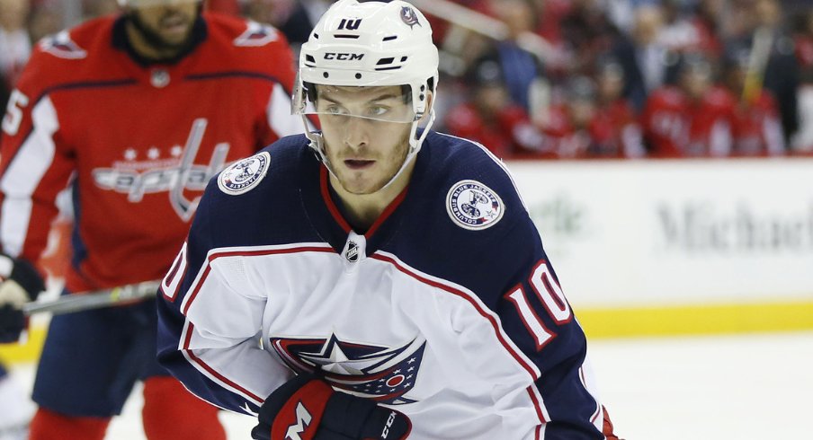 Columbus Blue Jackets forward Alexander Wennberg controls the puck during a regular-season matchup against the Washington Capitals in February of 2018 at Capital One Arena.