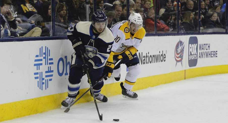 Jan 10, 2019; Columbus, OH, USA; Columbus Blue Jackets defenseman Ryan Murray (27) takes the puck from Nashville Predators center Colton Sissons (10) during the second period at Nationwide Arena. 