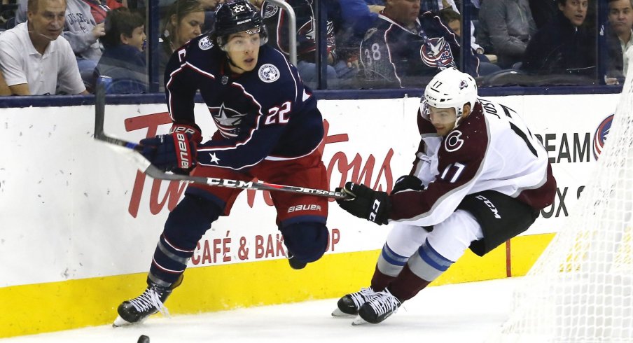 Oct 9, 2018; Columbus, OH, USA; Columbus Blue Jackets left wing Sonny Milano (22) looks to pass as Colorado Avalanche center Tyson Jost (17) defends during the first period at Nationwide Arena.