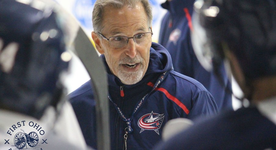 Columbus Blue Jackets head coach John Tortorella instructs his players during a training camp practice at the OhioHealth Ice Haus.