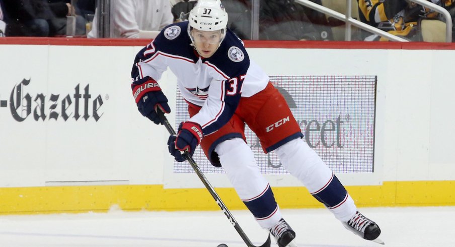 Markus Hannikainen skates with the puck during a game against the Pittsburgh Penguins at PPG Paints Arena.