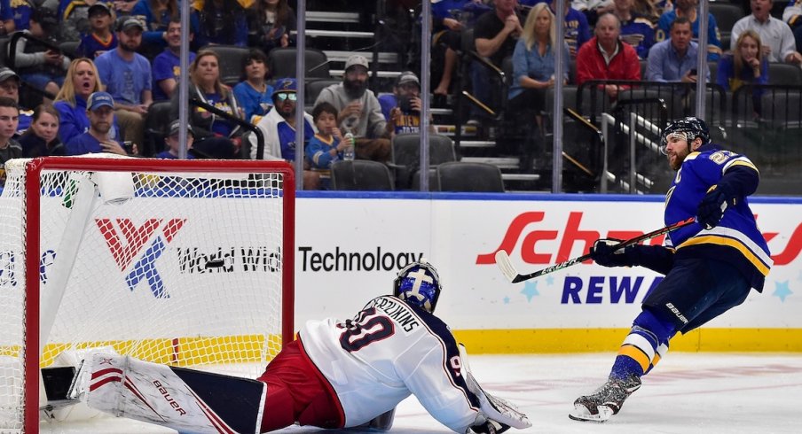 St. Louis Blues defenseman Alex Pietrangelo (27) scores against Columbus Blue Jackets goaltender Elvis Merzlikins (90) during the second period at Enterprise Center.