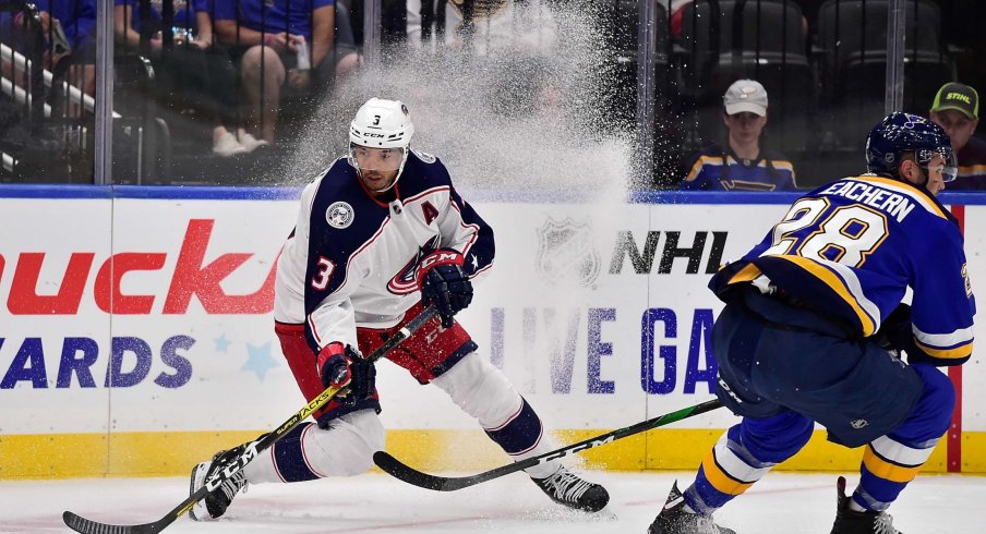 Sep 22, 2019; St. Louis, MO, USA; Columbus Blue Jackets defenseman Seth Jones (3) handles the puck as St. Louis Blues left wing Mackenzie MacEachern (28) defends during the second period at Enterprise Center.