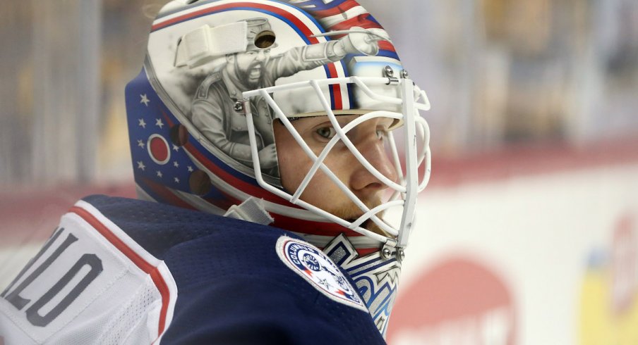 Columbus Blue Jackets goaltender Joonas Korpisalo looks on during a game against the Toronto Maple Leafs.