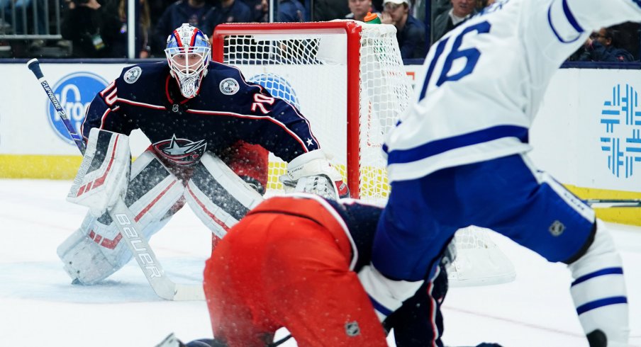 Columbus Blue Jackets goaltender Joonas Korpisalo (70) defends the net against the Toronto Maple Leafs in the first period at Nationwide Arena.