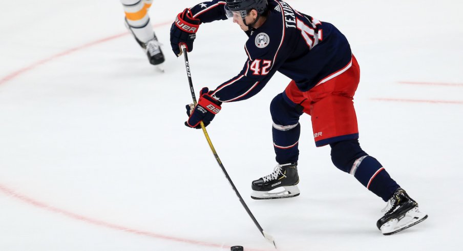 Columbus Blue Jackets center Alexandre Texier (42) shoots and scores the game winning goal against the Buffalo Sabres in the overtime period at Nationwide Arena.