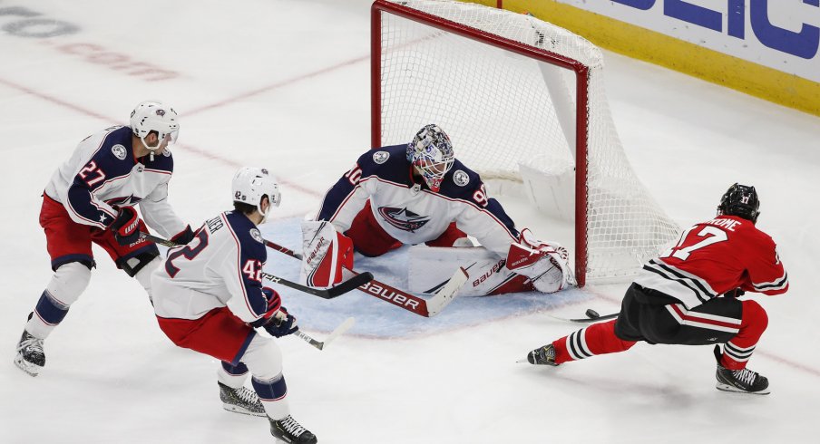 Oct 18, 2019; Chicago, IL, USA; Chicago Blackhawks center Dylan Strome (17) tries to score against Columbus Blue Jackets goaltender Elvis Merzlikins (90) during the second period at United Center.