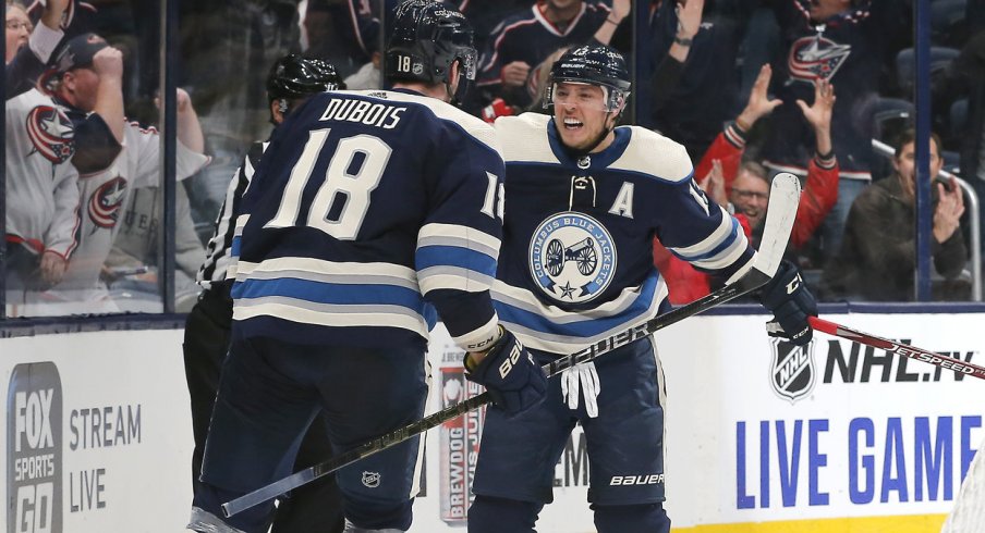 Oct 24, 2019; Columbus, OH, USA; Columbus Blue Jackets right wing Cam Atkinson (13) celebrates a goal against the Carolina Hurricanes during overtime at Nationwide Arena. Mandatory Credit: Russell LaBounty-USA TODAY Sports