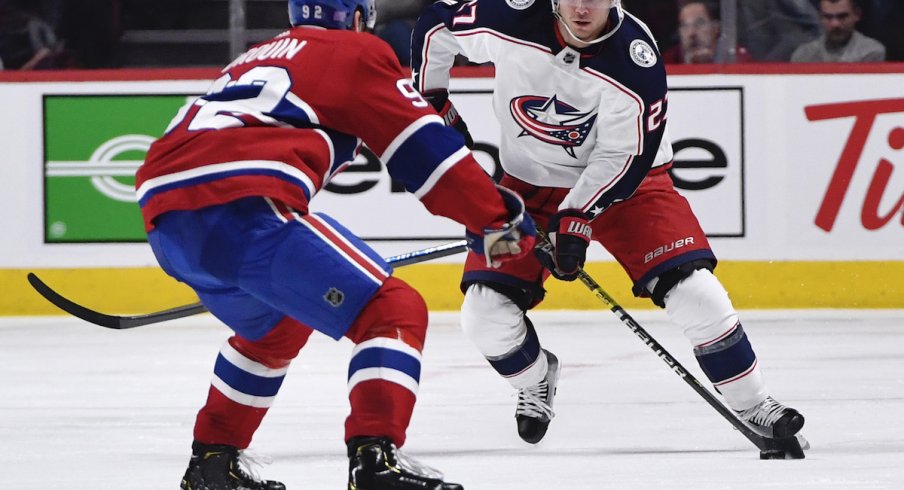 Columbus Blue Jackets defenseman Ryan Murray (27) plays the puck and Montreal Canadiens forward Jonathan Drouin (92) defends during the second period at the Bell Centre.