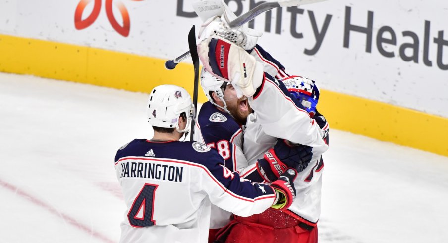 Columbus Blue Jackets goaltender Joonas Korpisalo (70) celebrates with teammates after defeating the Arizona Coyotes at Gila River Arena. 