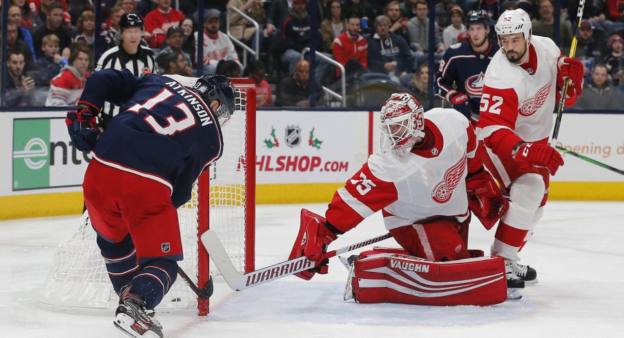 Nov 21, 2019; Columbus, OH, USA; Columbus Blue Jackets right wing Cam Atkinson (13) scores a goal against Detroit Red Wings goalie Jimmy Howard (35) during the second period at Nationwide Arena. Mandatory Credit: Russell LaBounty-USA TODAY Sports