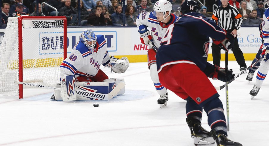 New York Rangers goalie Alexandar Georgiev (40) makes a save against the Columbus Blue Jackets during the first period at Nationwide Arena.