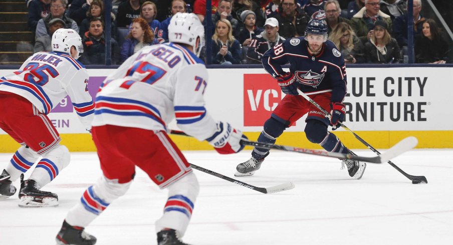 Dec 5, 2019; Columbus, OH, USA; Columbus Blue Jackets center Boone Jenner (38) shoots the puck against the New York Rangers during the first period at Nationwide Arena.