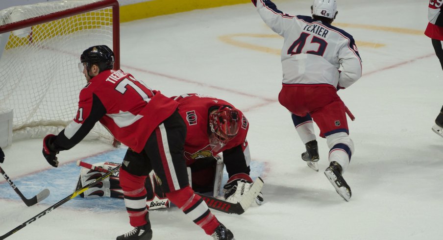 Dec 14, 2019; Ottawa, Ontario, CAN; Columbus Blue Jackets center Alexandre Texier (42) celebrates after scoring a goal past Ottawa Senators goalie Anders Nilsson (31) in the third period at the Canadian Tire Centre. Mandatory Credit: Marc DesRosiers-USA TODAY Sports