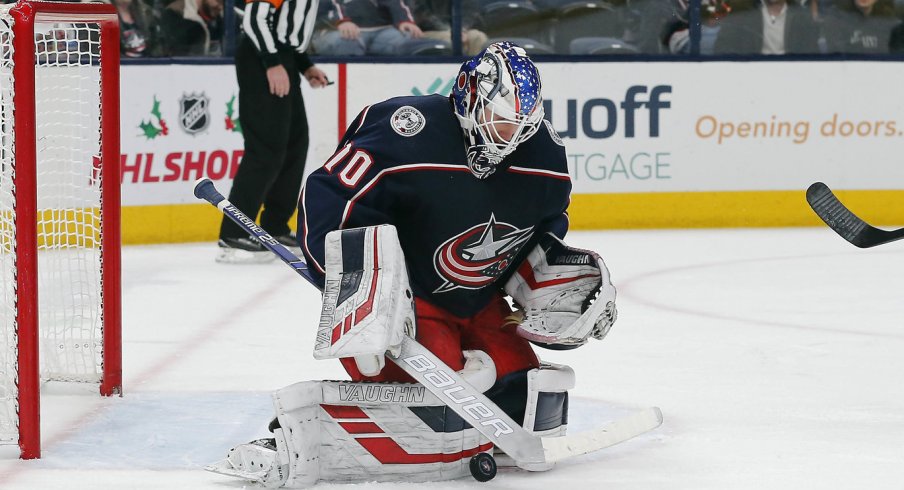 Dec 16, 2019; Columbus, OH, USA; Columbus Blue Jackets goalie Joonas Korpisalo (70) makes a save against the Washington Capitals during the first period at Nationwide Arena. Mandatory Credit: Russell LaBounty-USA TODAY Sports