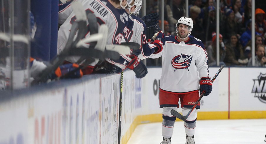 Dec 23, 2019; Uniondale, New York, USA; Columbus Blue Jackets left wing Nathan Gerbe (24) celebrates his goal against the New York Islanders with teammates during the second period at Nassau Veterans Memorial Coliseum. Mandatory Credit: Brad Penner-USA TODAY Sports