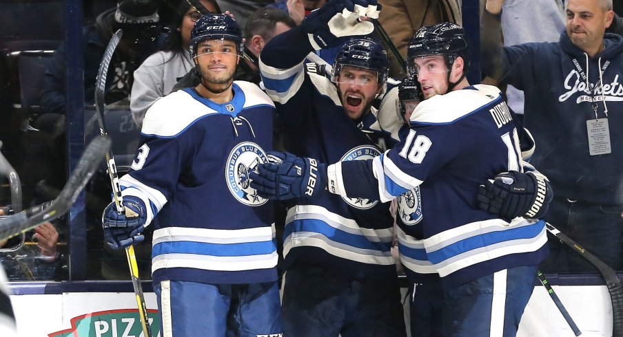 Seth Jones, Boone Jenner, Gustav Nyquist and Pierre-Luc Dubois celebrate Jenner's tying goal for the Columbus Blue Jackets against the Los Angeles Kings on Dec. 19.