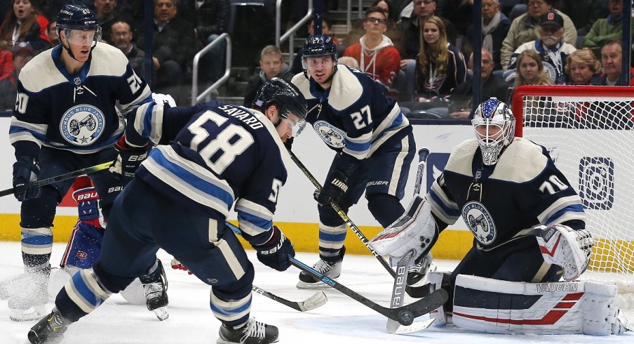 David Savard and Ryan Murray keep the puck out of the net