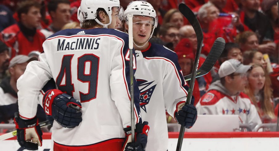 Dec 27, 2019; Washington, District of Columbia, USA; Columbus Blue Jackets left wing Jakob Lilja (15) celebrates with teammates after scoring a goal against the Washington Capitals in the second period at Capital One Arena. Mandatory Credit: Geoff Burke-USA TODAY Sports