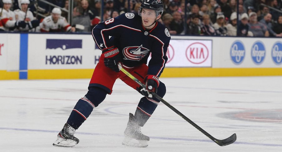 Dec 31, 2019; Columbus, Ohio, USA; Columbus Blue Jackets defenseman Zach Werenski (8) looks to pass against the Florida Panthers during the second period at Nationwide Arena.