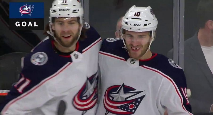 Stenlund and Wennberg celebrate a goal