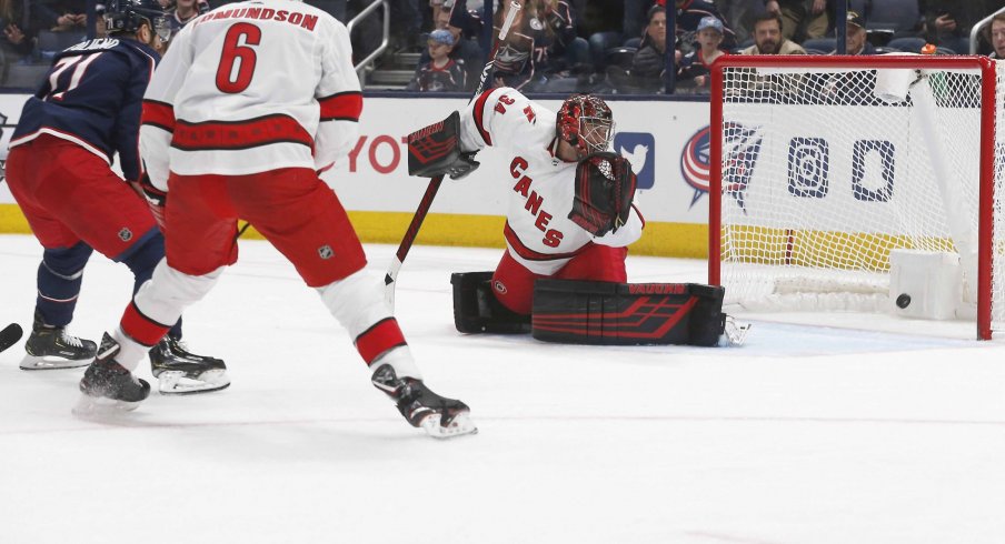 Jan 16, 2020; Columbus, Ohio, USA; Columbus Blue Jackets left wing Nick Foligno (71) sends the puck past Carolina Hurricanes goalie Petr Mrazek (34) for the game winning goal during the third period at Nationwide Arena.