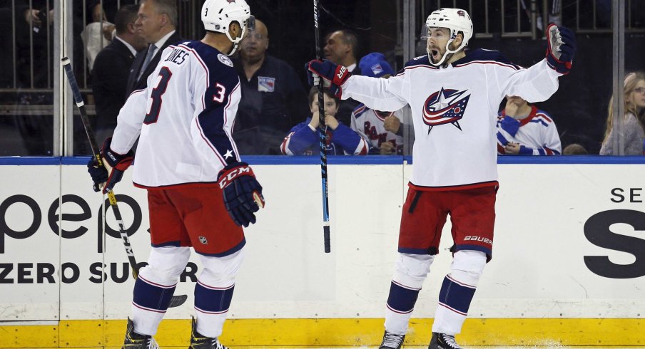 Jan 19, 2020; New York, New York, USA; Columbus Blue Jackets right wing Oliver Bjorkstrand (28) celebrates with teammates after scoring the game winning goal during the third period against the New York Rangers at Madison Square Garden.