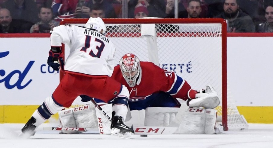 Columbus Blue Jackets forward Cam Atkinson (13) can not score against Montreal Canadiens goalie Carey Price (31) during the shootout period at the Bell Centre. 