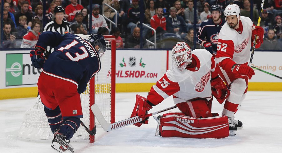 Columbus Blue Jackets right wing Cam Atkinson (13) scores a goal against Detroit Red Wings goalie Jimmy Howard (35) during the second period at Nationwide Arena.