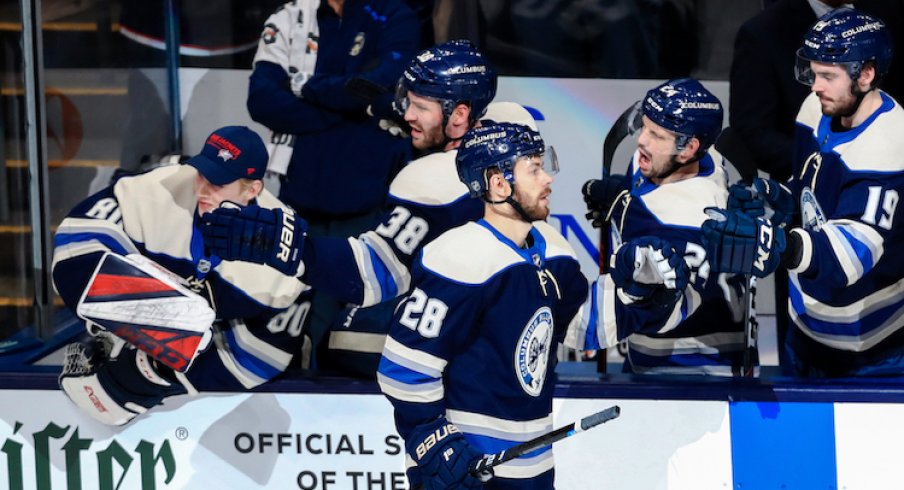 Columbus Blue Jackets right wing Oliver Bjorkstrand (28) celebrates with teammates on the bench after scoring a goal against the Tampa Bay Lightning in the second period at Nationwide Arena