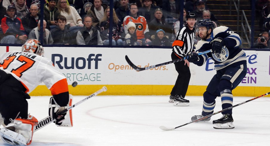 Nov 27, 2019; Columbus, OH, USA; Philadelphia Flyers goalie Brian Elliott (37) makes a save against Columbus Blue Jackets right wing Oliver Bjorkstrand (28) during the second period at Nationwide Arena.