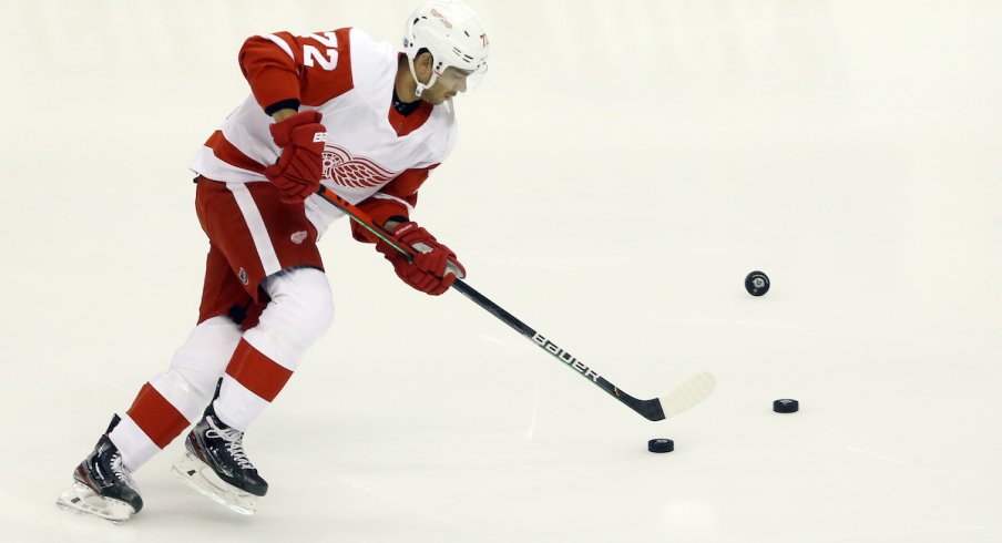 Detroit Red Wings left wing Andreas Athanasiou (72) warms up before playing the Pittsburgh Penguins at PPG PAINTS Arena.