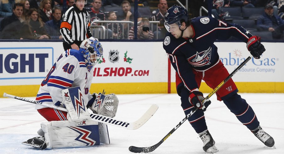 New York Rangers goalie Alexandar Georgiev (40) makes a save against Columbus Blue Jackets right wing Josh Anderson (77) during the first period at Nationwide Arena