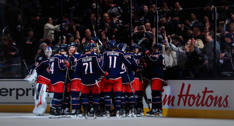 Feb 24, 2020; Columbus, Ohio, USA; The Columbus Blue Jackets bench reacts as center Emil Bemstrom (not pictured) scores the game winning against the Ottawa Senators in the overtime period at Nationwide Arena.