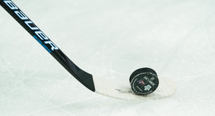 Oct 4, 2019; Columbus, OH, USA; A view of the Opening Night puck on the ice prior to the game between the Toronto Maple Leafs and the Columbus Blue Jackets at Nationwide Arena.