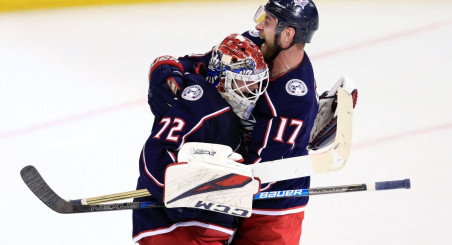 Apr 16, 2019; Columbus, OH, USA; Columbus Blue Jackets goaltender Sergei Bobrovsky (72) reacts with center Brandon Dubinsky (17) against the Tampa Bay Lightning in game four of the first round of the 2019 Stanley Cup Playoffs at Nationwide Arena.