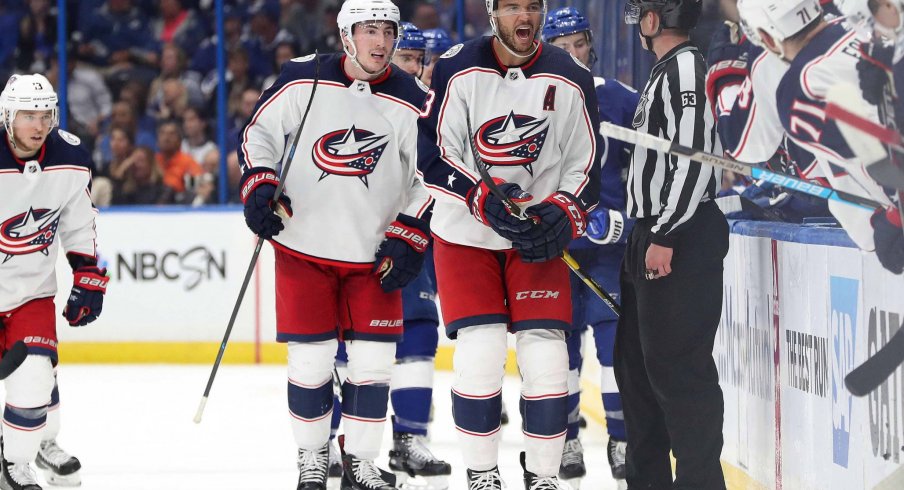 Apr 10, 2019; Tampa, FL, USA; Columbus Blue Jackets defenseman Seth Jones (3) celebrates with teammates after scoring the game winning goal against the Tampa Bay Lightning during the third period of game one of the first round of the 2019 Stanley Cup Playoffs at Amalie Arena.