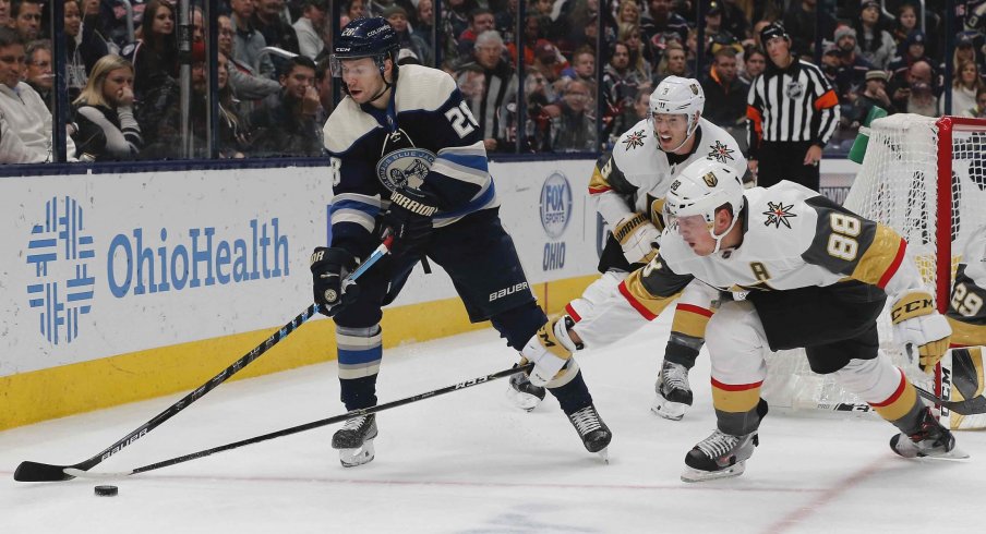 Nov 5, 2019; Columbus, OH, USA; Vegas Golden Knights defenseman Nate Schmidt (88) reaches to steal the puck from Columbus Blue Jackets right wing Oliver Bjorkstrand (28) during the second period at Nationwide Arena.