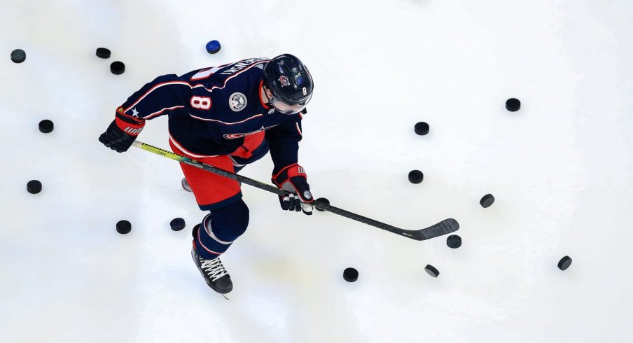 Columbus Blue Jackets defenseman Zach Werenski (8) skates on the ice during warmups prior to the game against the New York Rangers at Nationwide Arena.