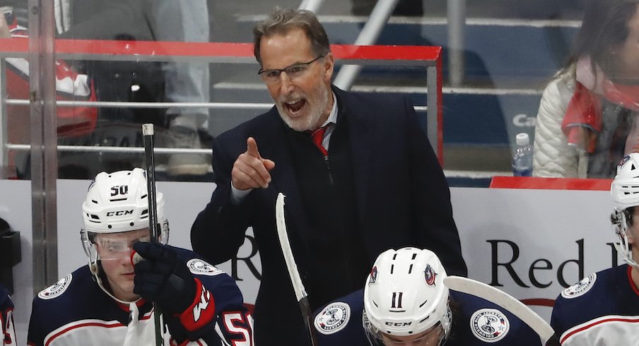 Columbus Blue Jackets head coach John Tortorella instructs his players during a training camp practice at the OhioHealth Ice Haus.