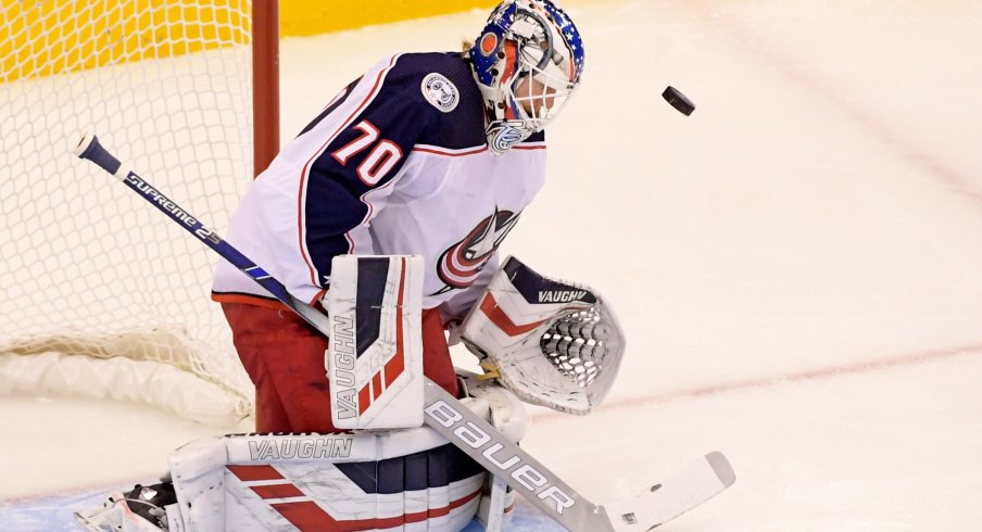 Columbus Blue Jackets goaltender Joonas Korpisalo (70) makes a save against the Tampa Bay Lightning during the first period in game two of the first round of the 2020 Stanley Cup Playoffs at Scotiabank Arena.