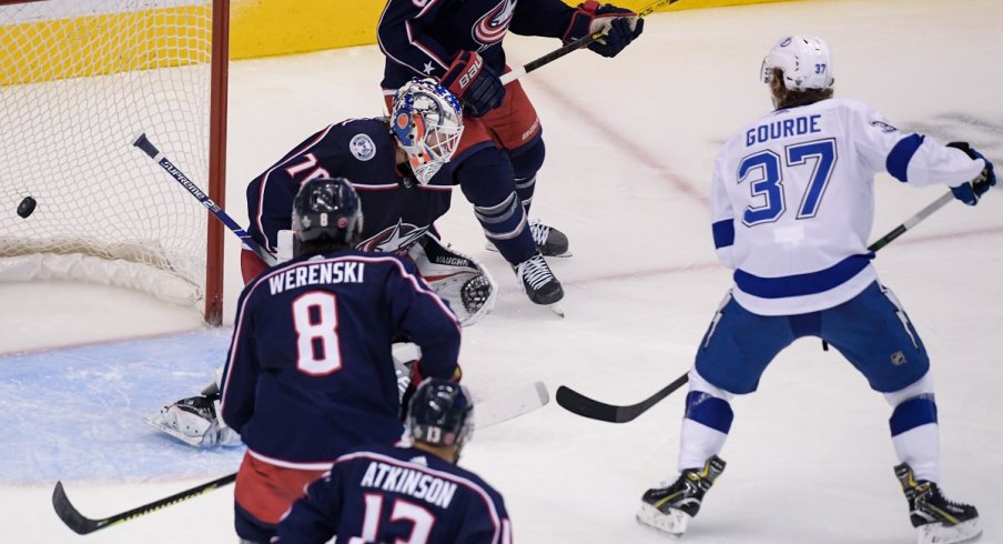 Yanni Gourde tips in the game-winning-goal for the Tampa Bay Lightning