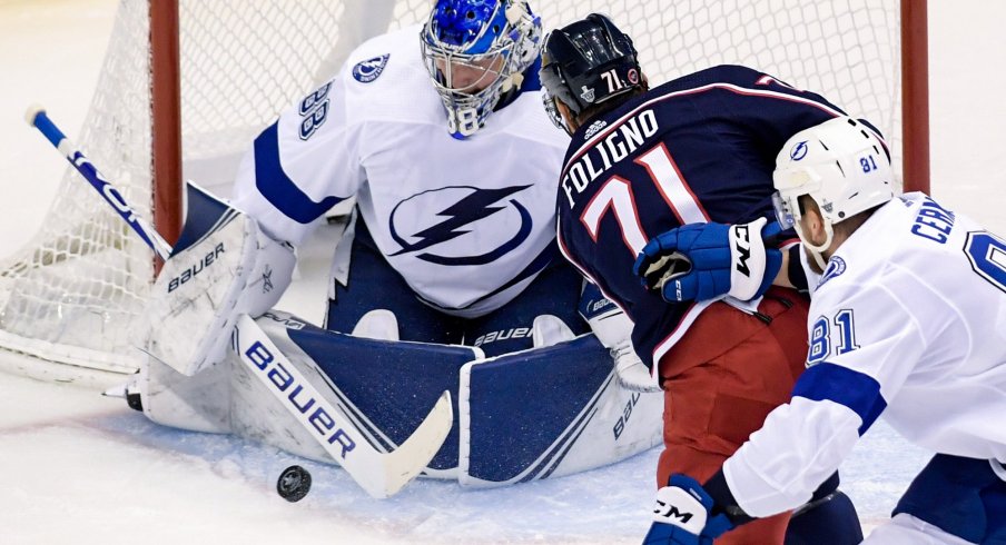 Aug 17, 2020; Toronto, Ontario, CAN; Columbus Blue Jackets left wing Nick Foligno (71) attempts a shot on Tampa Bay Lightning goaltender Andrei Vasilevskiy (88) as defenseman Erik Cernak (81) trails in the first period in game four of the first round of the 2020 Stanley Cup Playoffs at Scotiabank Arena.