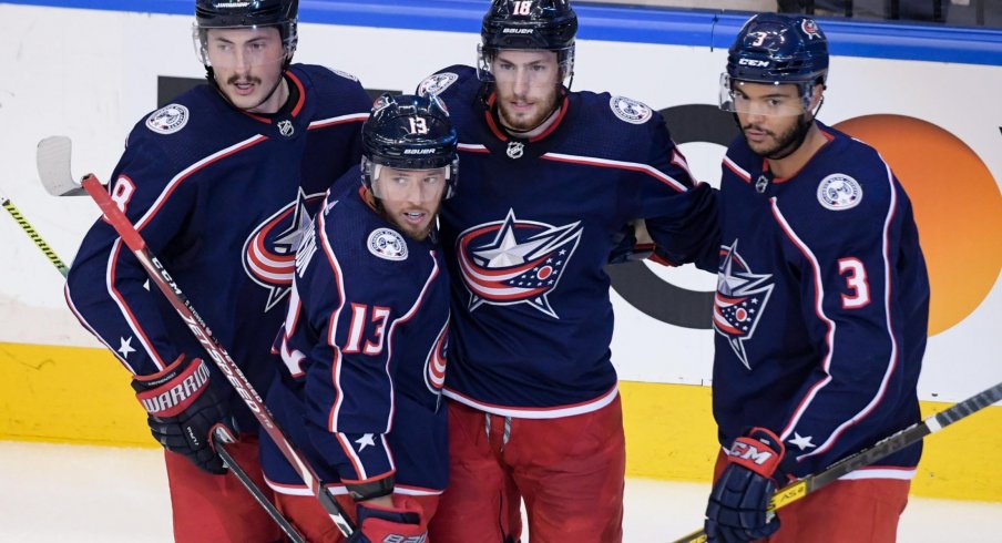 Aug 17, 2020; Toronto, Ontario, CAN; Columbus Blue Jackets right wing Cam Atkinson (13) celebrates with teammates , defenseman Zach Werenski (8), center Pierre-Luc Dubois (18), and defenseman Seth Jones (3) after scoring a goal in the second period in game four of the first round of the 2020 Stanley Cup Playoffs at Scotiabank Arena.