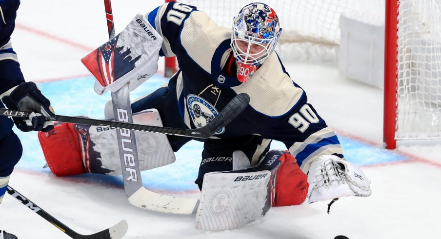 Feb 10, 2020; Columbus, Ohio, USA; Columbus Blue Jackets goaltender Elvis Merzlikins (90) tosses the puck aside after making a save against the Tampa Bay Lightning in the second period at Nationwide Arena.